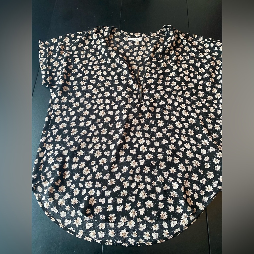 Woman’s flowered top